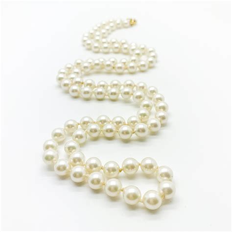 christian dior vintage pearl necklace|dior garland necklace history.